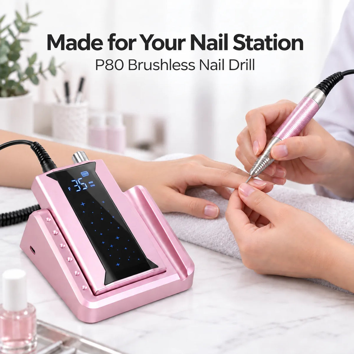 P80 pink brushless nail drill used at a professional nail station