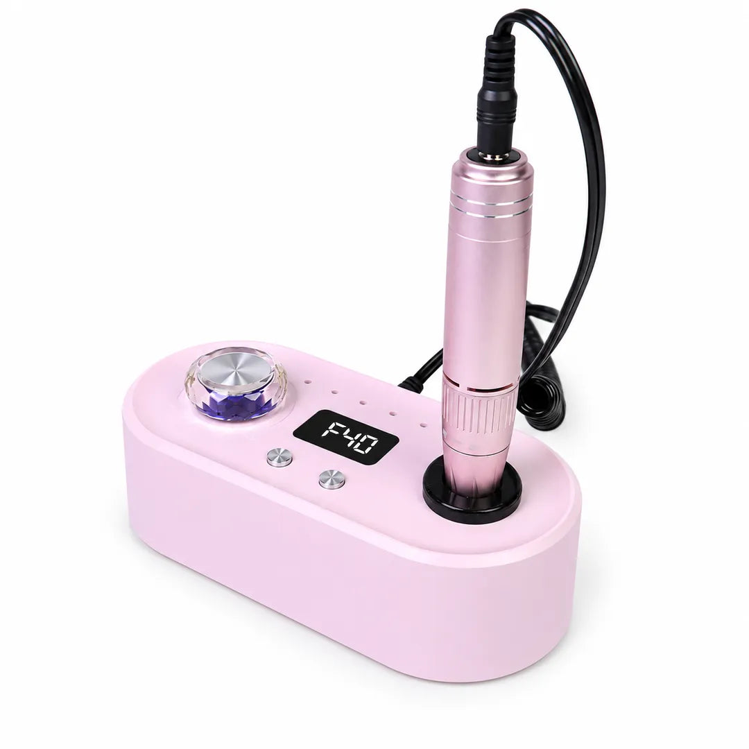 Wellstry UV-701 pink 24W plug-in nail drill on a white background